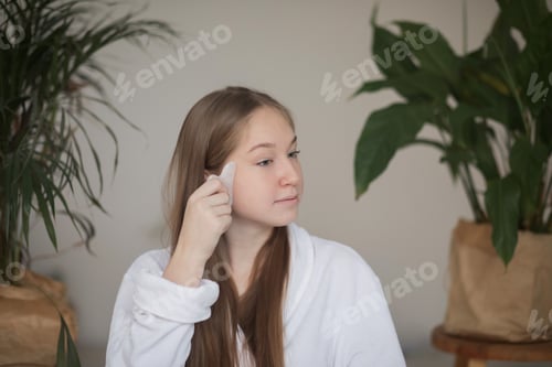 Preview: Teen Using Gua Sha Tool at Home