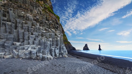 Preview: landscape with basalt rock formations Troll Toes on Black beach Reynisfjara near the village of Vik