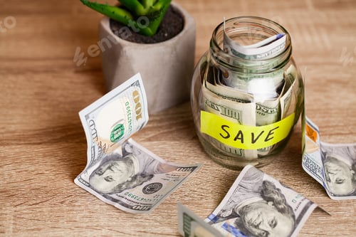 Preview: Savings Concept: Dollar Bills in a Glass Jar