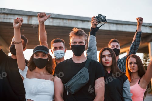 Preview: Group of protesting young people that standing together