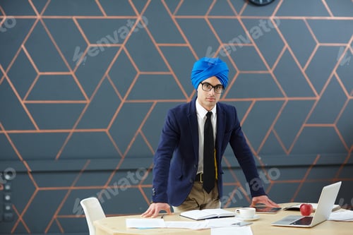 Preview: Businessman by desk