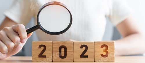 Preview: 2023 block with magnifying glass.