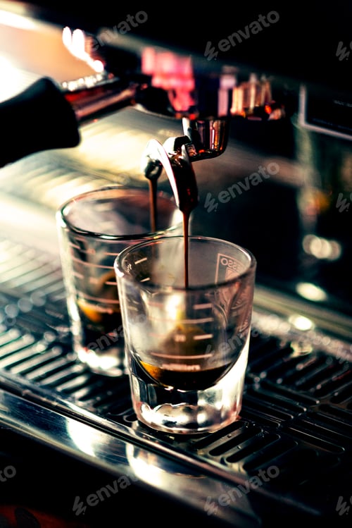 Preview: making espresso coffee close up detail with modern machine