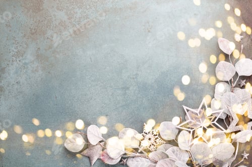 Preview: New Year celebration and Christmas background eucalyptus and Christmas star decorations top view.