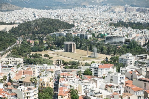 Preview: Ancient remains scenic view from Lycabettus Hill. Urban cityscape, blue sea and sky background