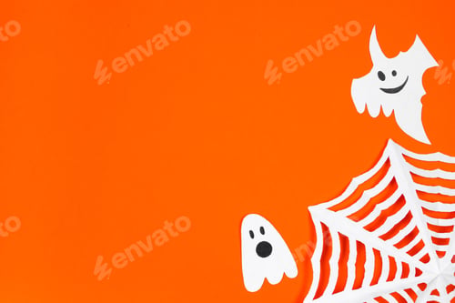 Preview: Happy Halloween. Funny paper ghosts for the holiday on an orange background.