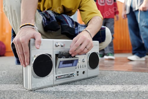 Preview: Holding Vintage Cassette Player with Close-Up View