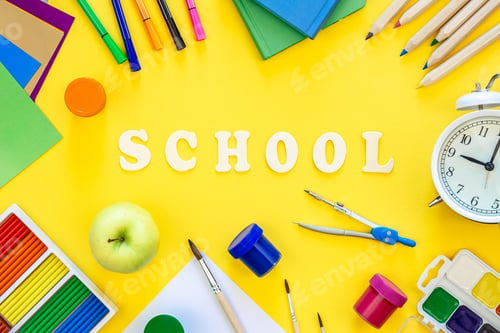 Preview: Colourful school supplies on a yellow background, back to school concept, top view.
