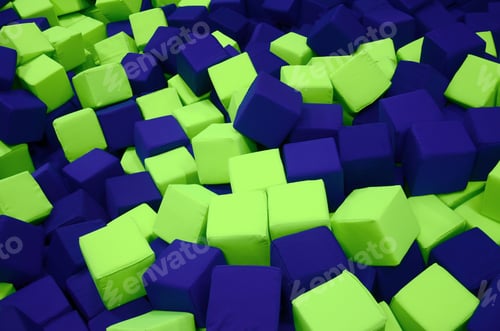 Preview: Many colorful soft blocks in a kids' ballpit at a playground