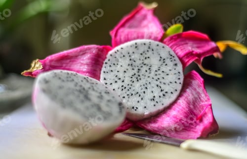 Preview: Sliced Dragon Fruit on a White Surface