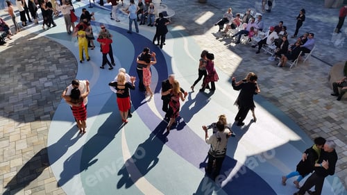Preview: Group of people dancing tango at milonga event in Tampa, FL, USA