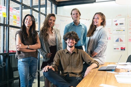 Preview: Portrait of creative business team. Hipster Creative Startup Young business people in modern office.