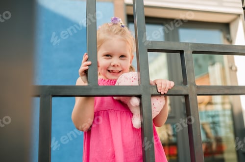 Preview: Summer portrait of happy cute child girl. Emotions and childhood concept