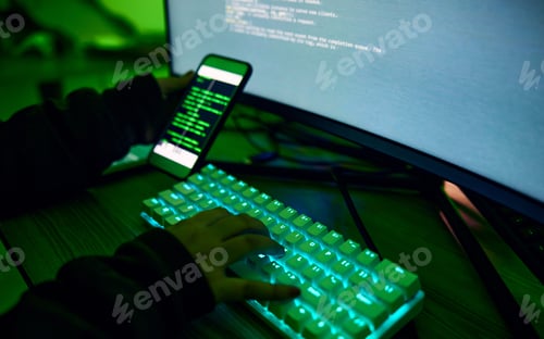 Preview: Phone, neon and hands typing on a keyboard while doing website design or coding on a computer at ni