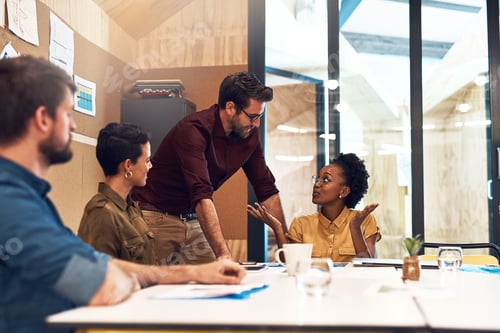 Preview: Shot of a diverse group of businesspeople having a meeting in an office