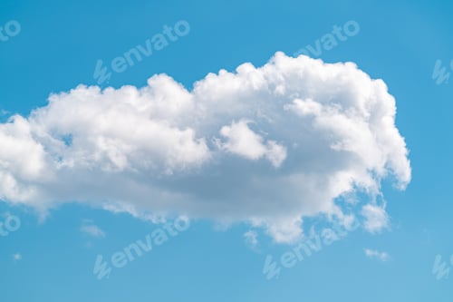 Preview: One fluffy cloud on blue sky
