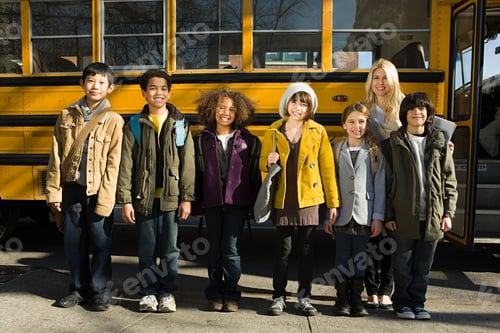 Preview: Children and teacher by school bus