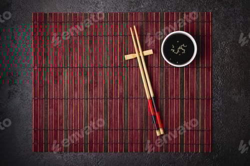 Preview: Asian Cuisine Setting with Chopsticks and Soy Sauce