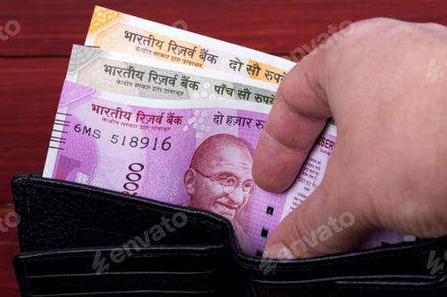 Preview: Indian money in the black wallet
