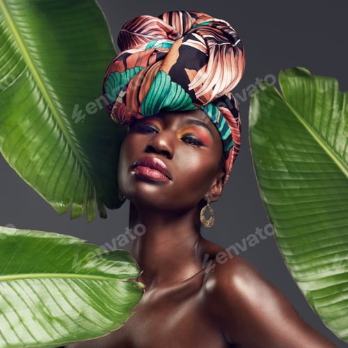 Stylish Woman with Head Wrap and Tropical Leaves