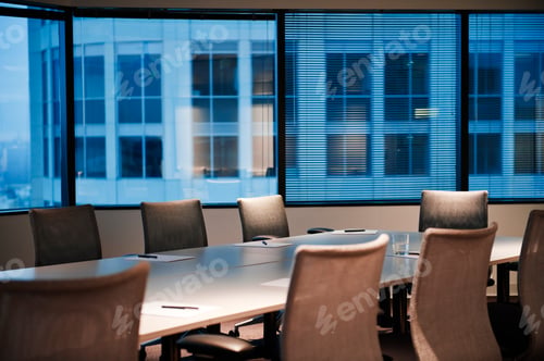 Preview: A conference room set up in the early evening.