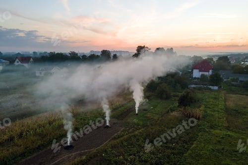 Preview: Aerial view of agricultural waste bonfires from dry grass and straw stubble burning