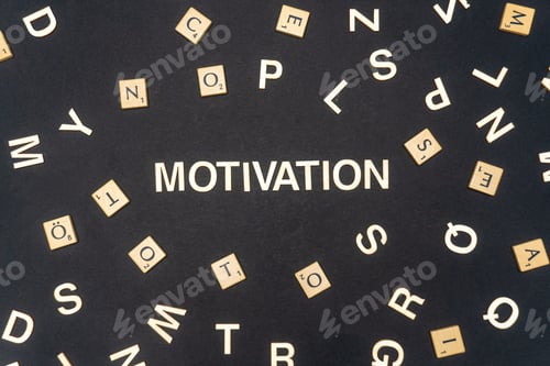 Preview: MOTIVATION word written on dark paper background. MOTIVATION text for your concepts
