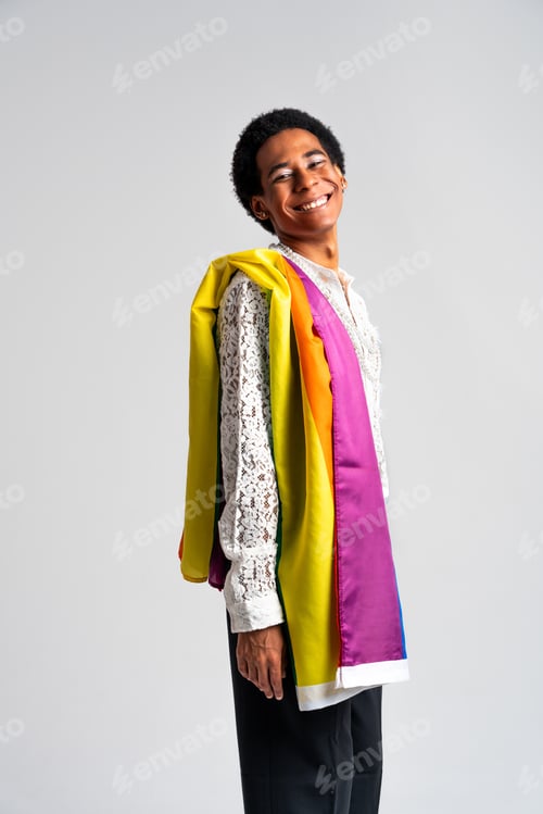 Preview: Fashionable fluid gender man posing in studio