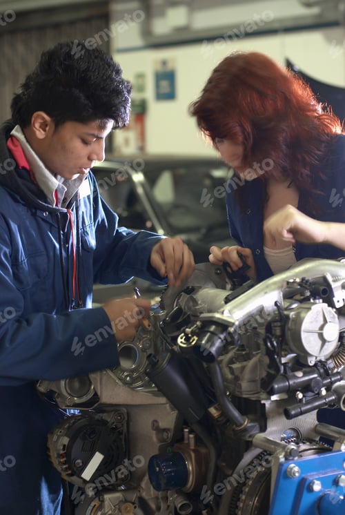 Preview: Student working on car engine