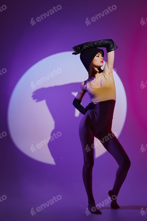 Preview: glamorous woman posing studio light neon color background unaltered