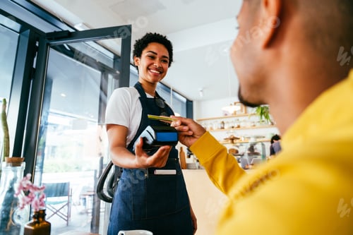 Preview: Barista working in a bar cafeteria