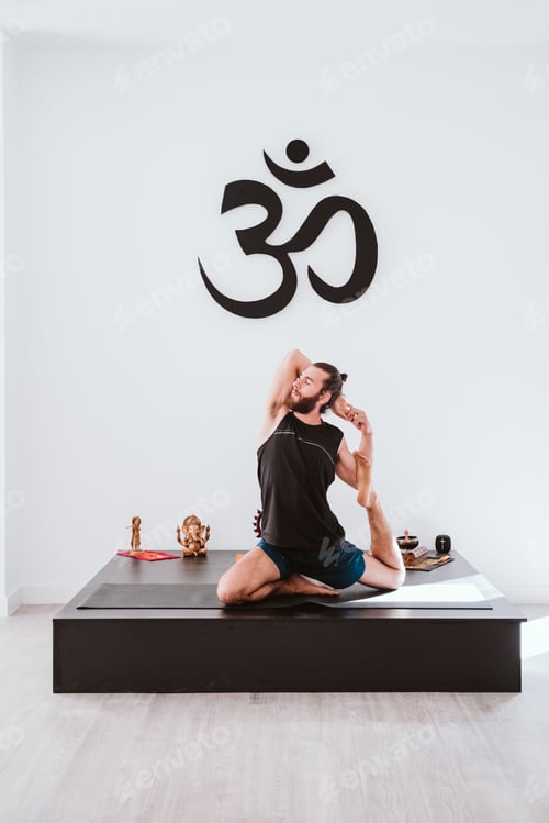 Preview: young man practicing yoga sport at the gym. Healthy lifestyle