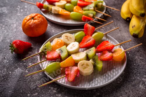 Preview: Colorful Fruit Skewers on White Plate