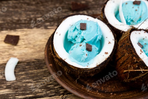 Preview: Blue ice cream in coconut bowl.