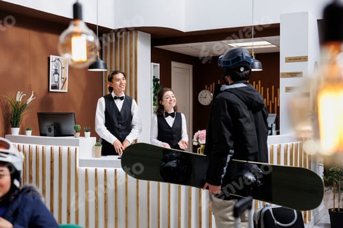 Preview: Lobby check-in: Employee assisting guest