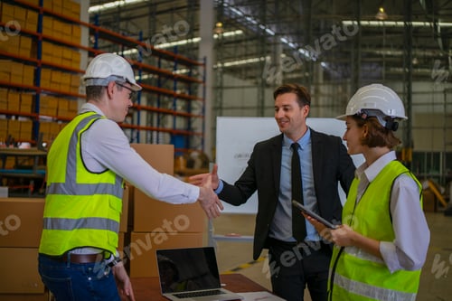 Preview: Blue collar workers are working and meeting at warehouse.