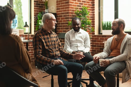 Vista previa: Diverse men sitting at aa group meeting