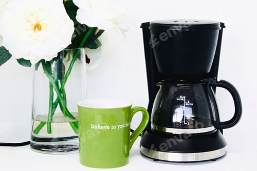 Preview: Believe in yourself mug, coffee maker and flowers is a good way to start your day
