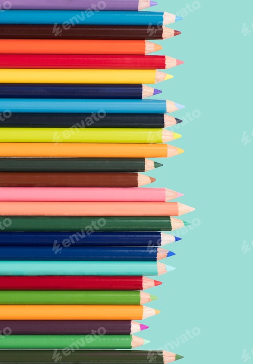 Preview: Colored pencils on solid teal colored background