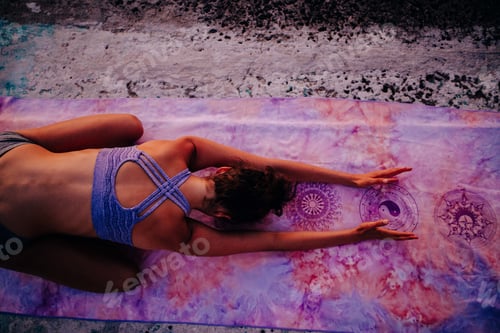 Preview: Woman Stretching on Yoga Mat Outdoors