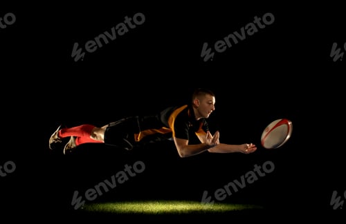Preview: Rugby player diving and passing