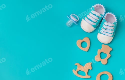 Preview: baby accessories for newborns on a colored background. selective focus.