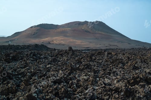 Preview: Volcanic landscape dominating the horizon in lanzarote, canary islands