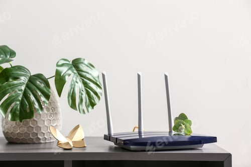 Preview: Modern Wi-Fi Router On Dark Table