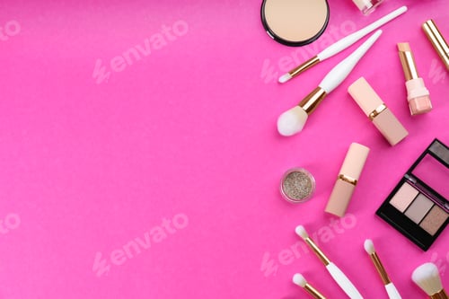 Preview: Flat lay composition with makeup brushes on bright pink background, space for text