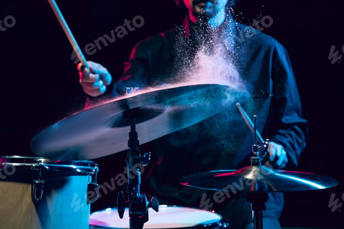 Preview: Drummer's rehearsing on drums before rock concert. Man recording music on drumset in studio