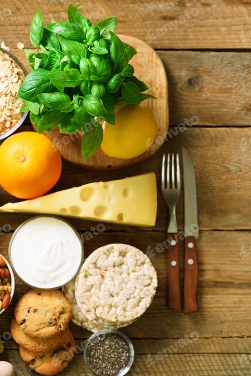 Preview: Healthy breakfast ingredients, food frame. Granola, egg, nuts, fruits, berries, toast, milk, yogurt