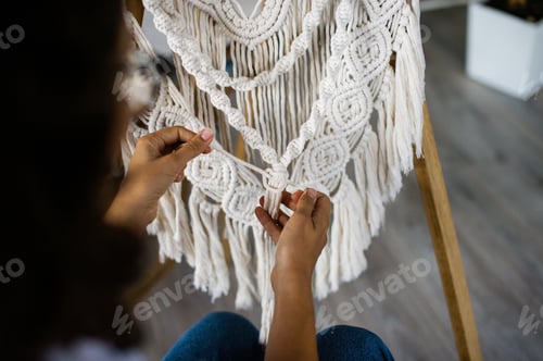 Preview: The production of boho-style panels is made of cotton threads of natural color in the macrame