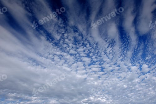 Preview: Fantastic view of the sky at sunset with cumulus clouds