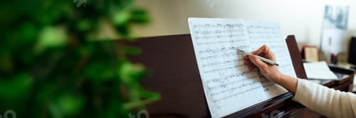 Preview: Hand Writing Music Notes on Sheet Wide Banner